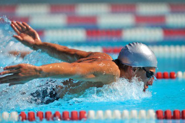 Man swimming butterfly.