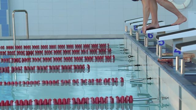 Man on starting block.